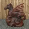 Product image 7 of the product “Dragon with leg lifted on the right made from suar wood, about 50cm Height ”